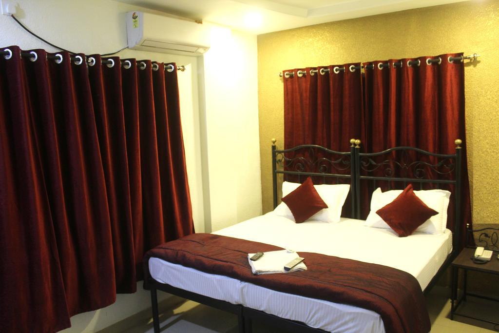 Hotel Preetam Aurangabad Værelse billede