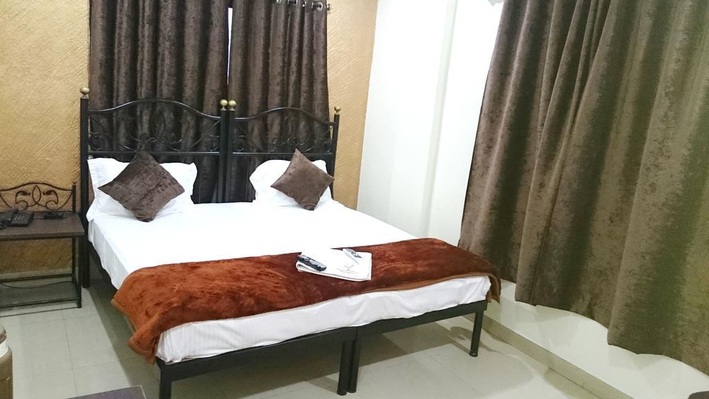 Hotel Preetam Aurangabad Værelse billede